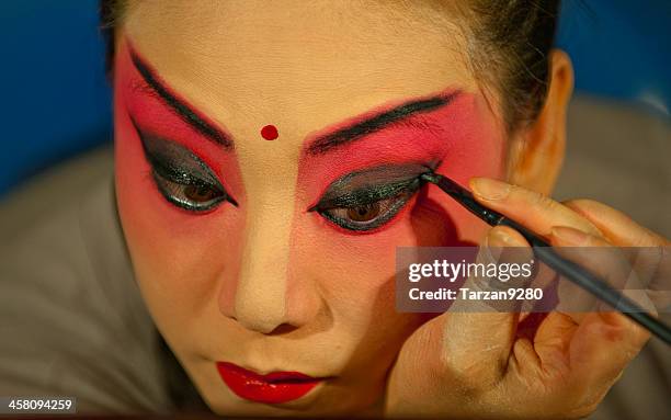 actress making up at back stage - chinese opera makeup stock pictures, royalty-free photos & images