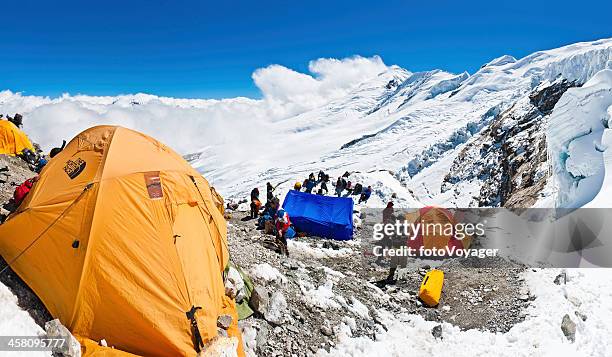 high altitude himalaya camp tents sherpas mountaineers nepal - base camp stock pictures, royalty-free photos & images