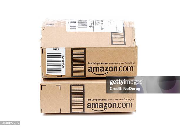 amazon online retailer packages - amazon package stock pictures, royalty-free photos & images