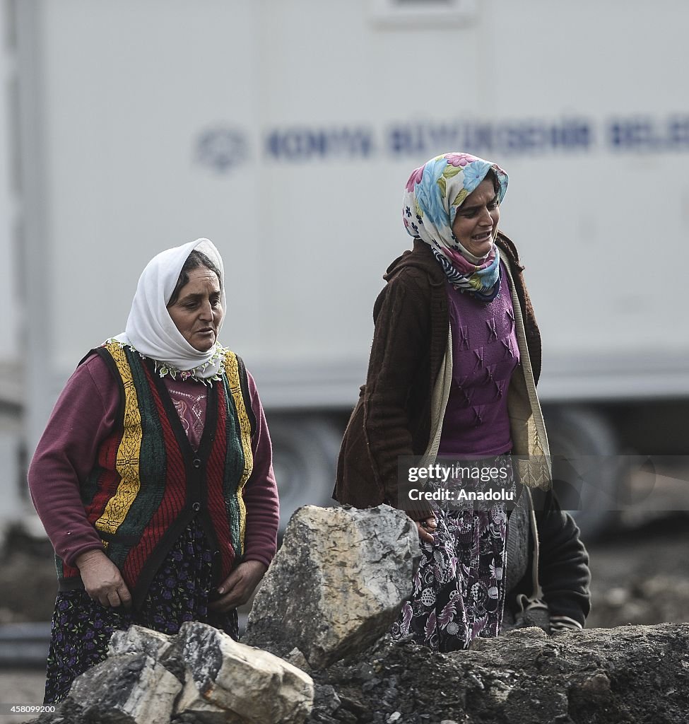 Relatives of miners trapped inside a coal mine in Turkey