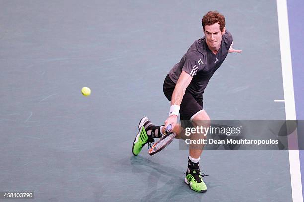 Andy Murray of Great Britain in action against Grigor Dimitrov of Bulgaria during day 4 of the BNP Paribas Masters held at the at Palais Omnisports...