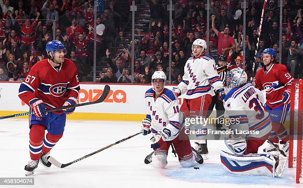 Max Pacioretty of the Montreal Canadiens celebrates after scoring a goal against of the New York Rangers in the NHL game at the Bell Centre on...