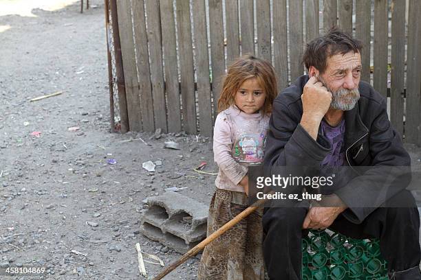 gipsy grandfather &amp; niece - local gypsy stock pictures, royalty-free photos & images