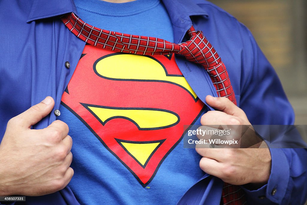 Superman Costume on Strong Young Man