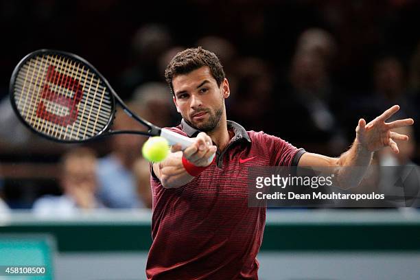 Grigor Dimitrov of Bulgaria in action Andy Murray of Great Britain during day 4 of the BNP Paribas Masters held at the at Palais Omnisports de Bercy...