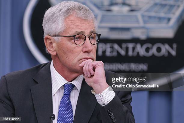 Defense Secretary Chuck Hagel answers reporters' questions during a news conference at the Pentagon October 30, 2014 in Arlington, Virginia. Hagel...