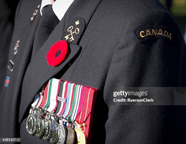 remembrance day ceremony, dartmouth nova scotia, canada. - military medal ceremony stock pictures, royalty-free photos & images