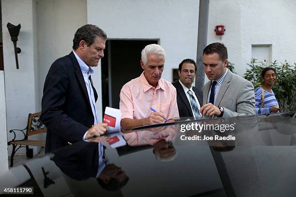 Former Florida Governor and now Democratic gubernatorial candidate Charlie Crist prepares to leave a campaign event at the Century Village Pembroke...