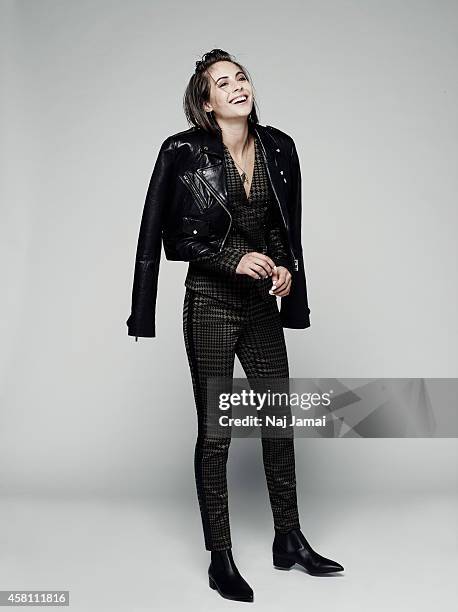 Actress and model Willa Holland is photographed for WhoWhatWear.com on October 8, 2014 in Los Angeles, California. Jacket, trousers, and boots ....