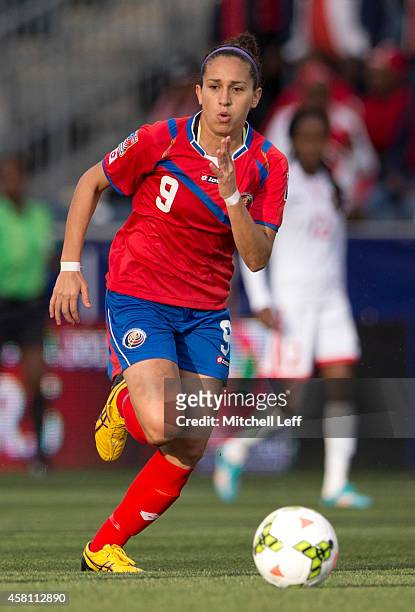Carolina Venegas of Costa Rica controls the ball in the game against Trinidad & Tobago in the 2014 CONCACAF Women's Championship semifinal game on...