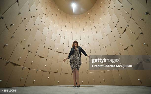 Ana Matronic pictured inside the installation by the artist Zimoun, which consists of 186 prepared dc-motors, cotton balls and stacked cardboard...