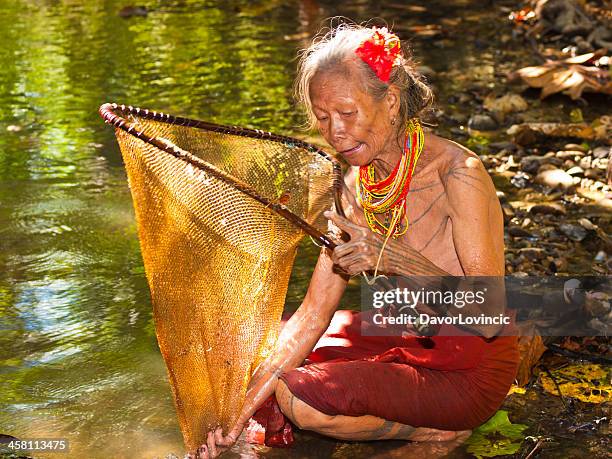 fishing woman - indonesia sumatra mentawai stock pictures, royalty-free photos & images