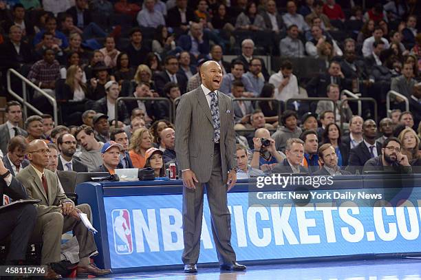 New York Knicks head coach Derek Fisher lets out a yell at New York Knicks vs Chicago Bulls, Opening Night at Madison Square Garden.