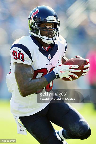 Wide receiver Andre Johnson of the Houston Texans carries the ball during a NFL game against the Tennessee Titans at LP Field on October 26, 2014 in...