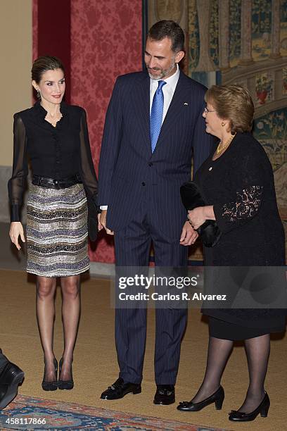 King Felipe VI of Spain , Queen Letizia of Spain and Chilean President Michelle Bachelet host a reception at the El Pardo Palace on October 30, 2014...