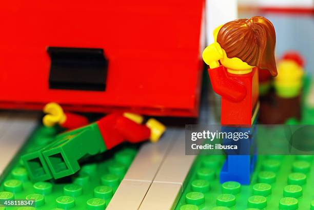 lego couple garage accident - broken figurine stock pictures, royalty-free photos & images