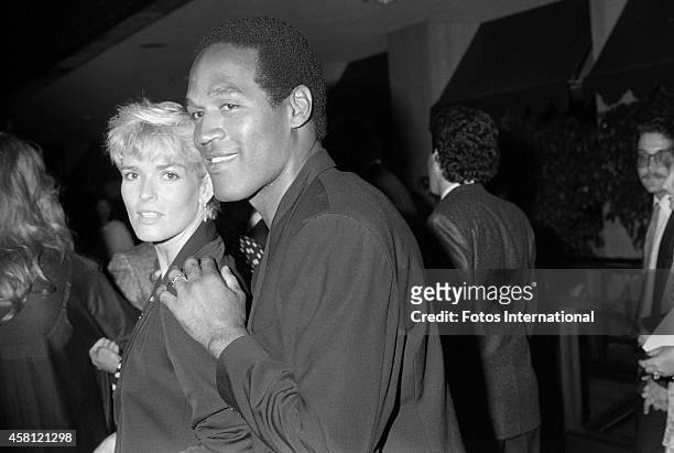 Nicole Brown Simpson and O.J. Simpson attend the movie premiere of "Ishtar" on May 13, 1987 in Century City, California.