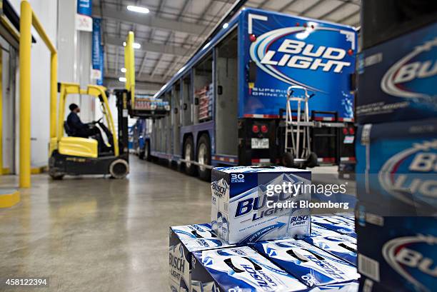 Cases of Anheuser-Busch beer are loaded into a delivery truck at Brewers Distributing Co. In Peoria, Illinois, U.S., on Thursday, Oct. 30, 2014....