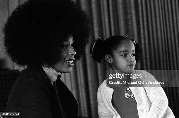 Marguerite Simpson, wife of O. J. Simpson, poses for a portrait at home while sitting next to her daughter Arnelle on January 8, 1973 in Los Angeles,...