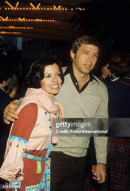 Neile Adams McQueen and boyfriend David Ross pose for a portrait at a movie premiere in April, 1977 in Los Angeles, California.