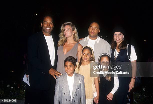 Simpson, Nicole Brown Simpson, Jason Simpson, Sydney Brooke Simpson, Justin Ryan Simpson pose at the premiere of the "Naked Gun 33 1/3: The Final...