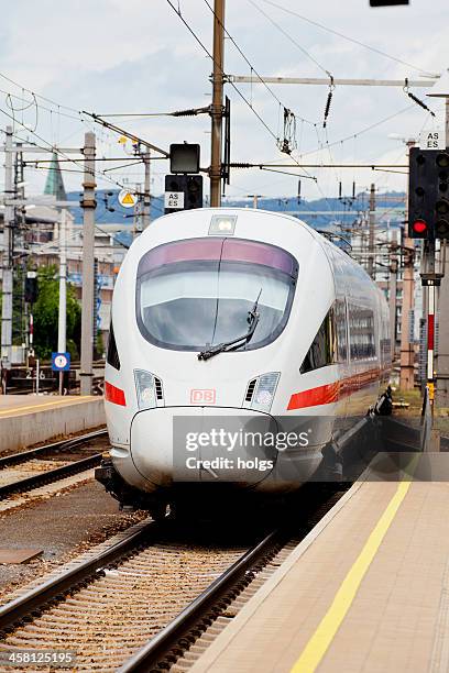 ice-t class train enters the station at linz - ice alphabet stock pictures, royalty-free photos & images