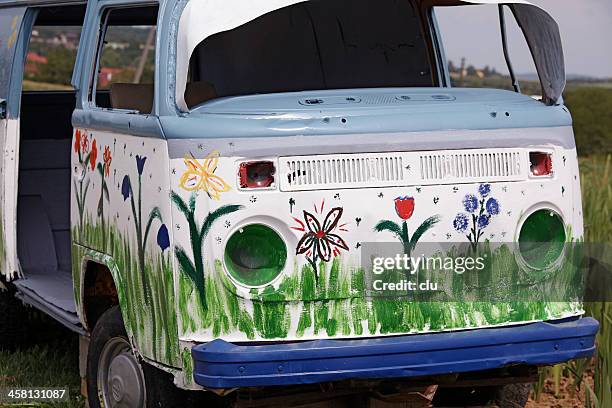 old unusable vw bus painted with flowers - vw bus stock pictures, royalty-free photos & images