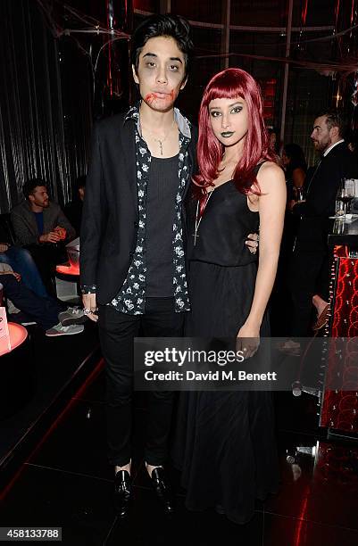 Tomo Kurata and Leah Weller attend Nightmare on Wardour Street at Wyld Bar on October 30, 2014 in London, United Kingdom.