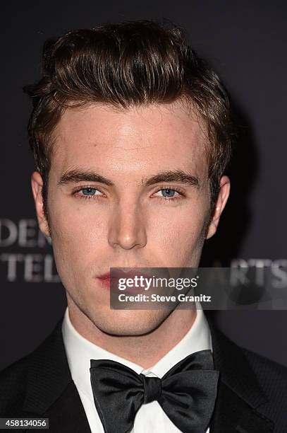 Actor Tom Hughes attends the BAFTA Los Angeles Jaguar Britannia Awards presented by BBC America and United Airlines at The Beverly Hilton Hotel on...