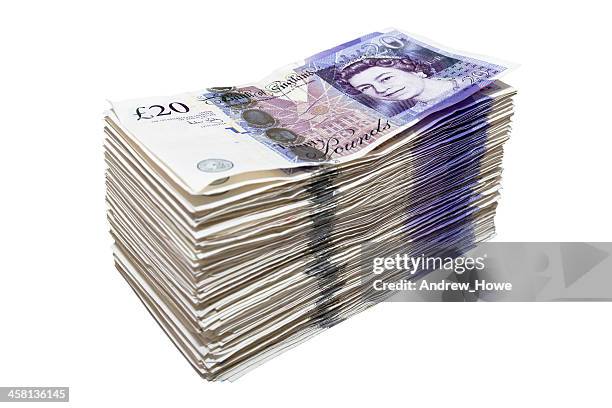 stack of twenty pound notes - british currency stock pictures, royalty-free photos & images