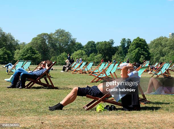 sunbathers in london's hyde park - editorial bildbanksfoton och bilder