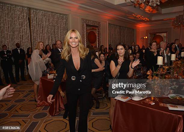 Supporter, Honoree, 2014 Childrens Champion Award Heidi Klum attends the 2014 UNICEF Children's Champion Award Dinner at The Four Seasons Hotel on...