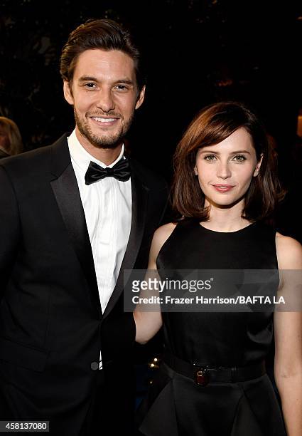 Actors Ben Barnes and Felicity Jones attend the BAFTA Los Angeles Jaguar Britannia Awards presented by BBC America and United Airlines at The Beverly...