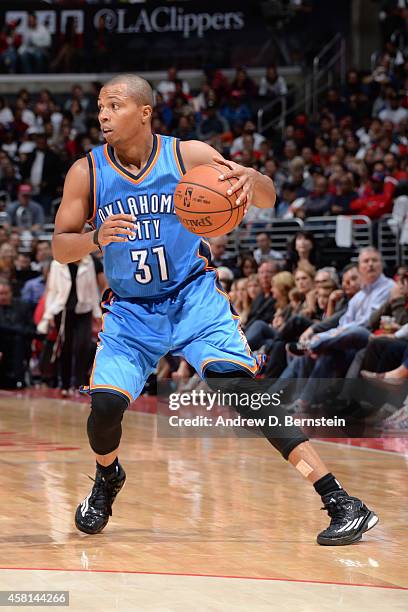 Sebastian Telfair of the Oklahoma City Thunder handles the ball against the Los Angeles Clippers on October 30, 2014 at the Staples Center in Los...