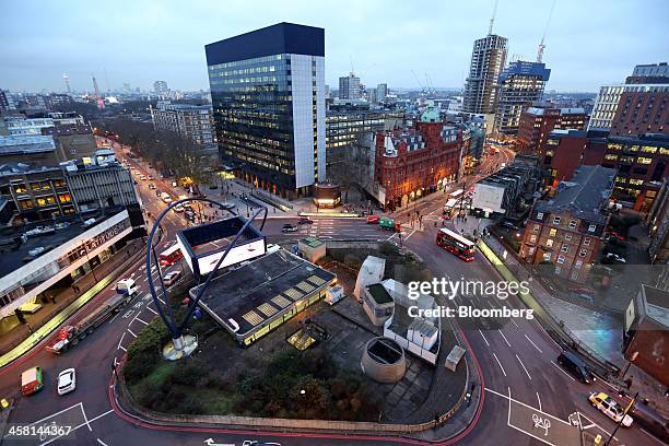 Traffic passes around the Old Street roundabout, in the area known as London's Tech City, in London, U.K., on Tuesday, Dec. 17, 2013. The U.K...