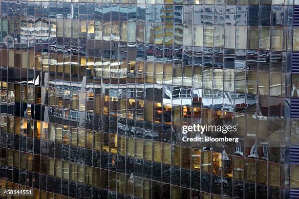 Reflections are seen in the glass windows of an office block as it stands in the area known as London's Tech City, near Old street roundabout, in...