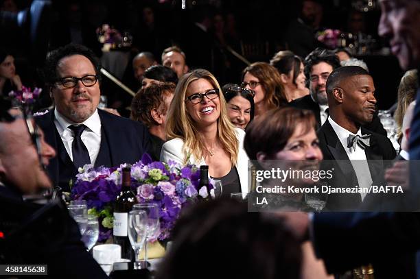 Actor/director Jon Favreau, Joya Tillem, Louise Daly and actor Jamie Foxx attend the BAFTA Los Angeles Jaguar Britannia Awards presented by BBC...