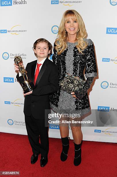Joan Dangerfield and Smokey Child attend UCLA's 2014 Visionary Ball benefiting the Department of Neurosurgery at the Beverly Wilshire Four Seasons...