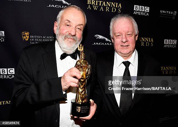 Honoree Mike Leigh, OBE and director Jim Sheridan attend the BAFTA Los Angeles Jaguar Britannia Awards presented by BBC America and United Airlines...