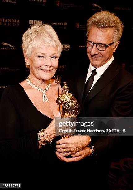 Honoree Dame Judi Dench and actor Dustin Hoffman attend the BAFTA Los Angeles Jaguar Britannia Awards presented by BBC America and United Airlines at...