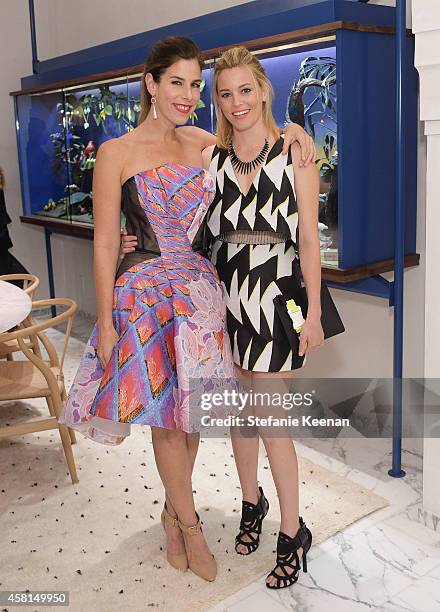 Jewelry designer Irene Neuwirth and actress Elizabeth Banks attend the Irene Neuwirth Flagship Grand Opening on October 30, 2014 in West Hollywood,...