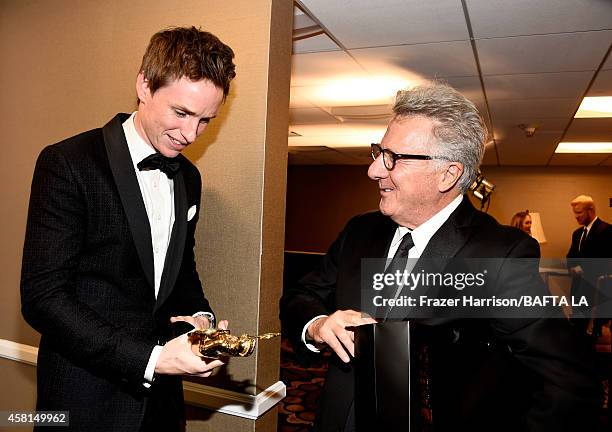 Actors Eddie Redmayne and Dustin Hoffman attend the BAFTA Los Angeles Jaguar Britannia Awards presented by BBC America and United Airlines at The...