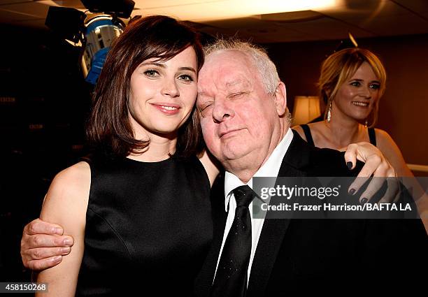 Actress Felicity Jones and guest attend the BAFTA Los Angeles Jaguar Britannia Awards presented by BBC America and United Airlines at The Beverly...