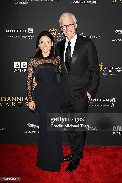 Julia Louis-Dreyfus and Brad Hall arrive at the BAFTA Los Angeles Jaguar Britannia Awards held at The Beverly Hilton Hotel on October 30, 2014 in...