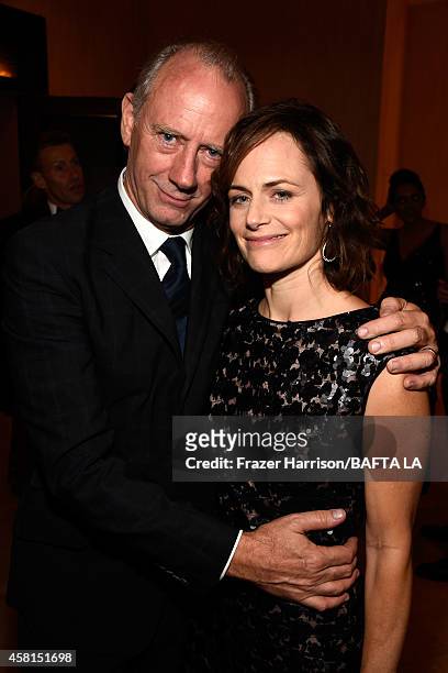 Actors Xander Berkeley and Sarah Clarke attend the BAFTA Los Angeles Jaguar Britannia Awards presented by BBC America and United Airlines at The...