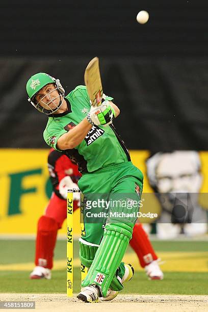 Luke Wright of the Stars hits a six off the bowling of Will Sheridan of the Renegades during the Big Bash League match between the Melbourne Stars...