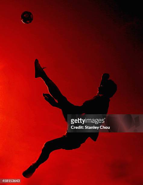 Yudi Pornomo of Indonesia warms up prior to the start of the Men's Team Double Final of the Sepak Takraw Competition between Indonesia and Burma...