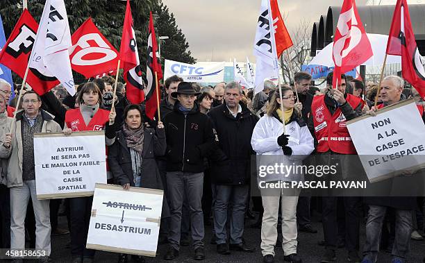 Around 800 of the 2,500 employees of Astrium, the space subsiduary of European aerospace giant EADS, demonstrate in front of the entrance of the site...
