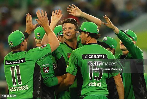 Jackson Bird of the Stars is congratulated by team mates after taking the wicket of Tom Cooper of the Renegades during the Big Bash League match...