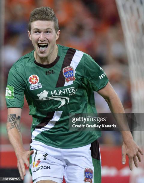 Joseph Gibbs of the Jets celebrates after scoring a goal to seal the match during the round 11 A-League match between Brisbane Roar and the Newcastle...